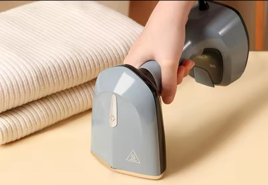 Przenośna i podręczna parowa prasowalnica do ciuchów